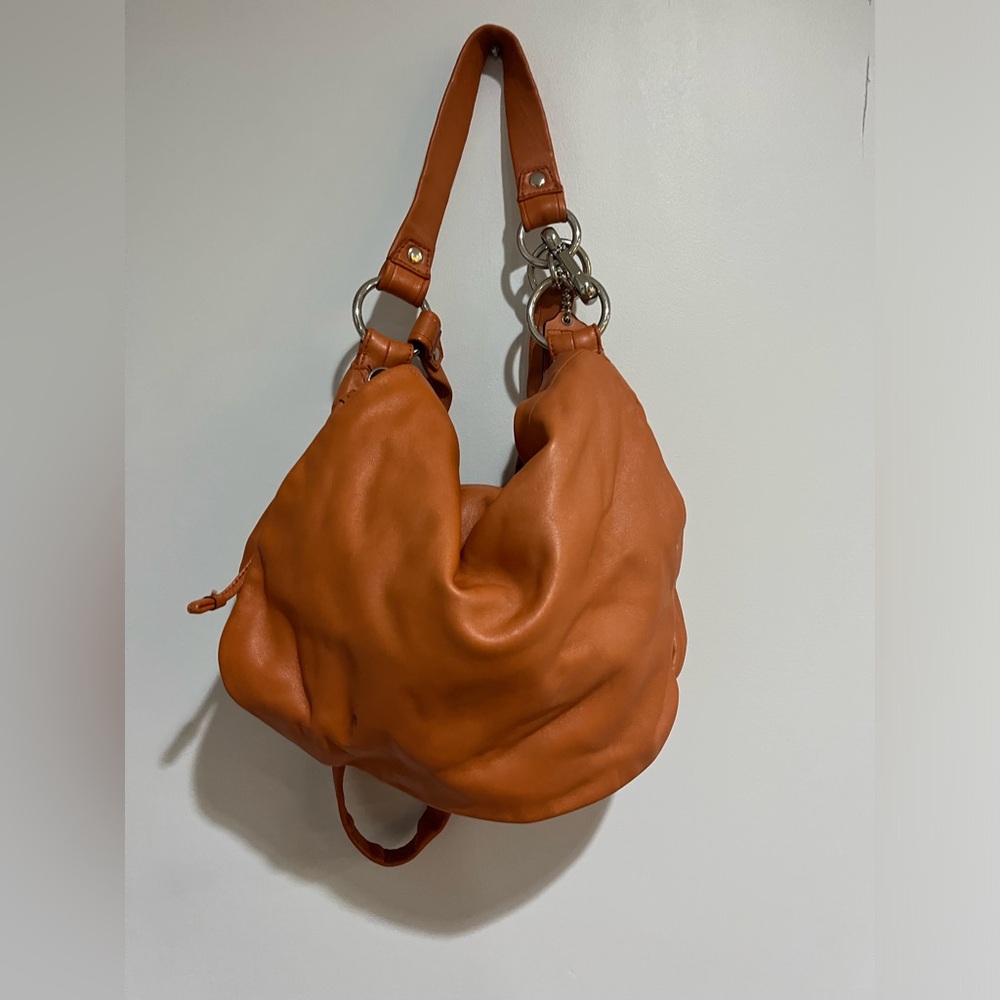 Coach leather bag, orange color (used)